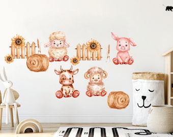 May include: A set of watercolor farm animal wall decals featuring a pig, cow, sheep, and a fence with sunflowers. The decals are perfect for a nursery or child's room.