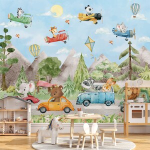 May include: A colorful children's room mural featuring animals driving vehicles. The mural depicts a blue van with a raccoon and rabbit, a yellow car with a bear, a red car with an elephant, and a blue airplane with a mouse. The mural also features a hot air balloon, a kite, and a yellow airplane with a panda.