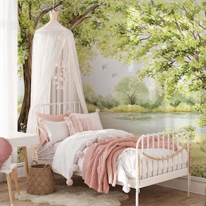May include: A white metal bed with a canopy, adorned with pink and white bedding and a matching throw blanket. The room features a nature-themed mural and a decorative heart-shaped pillow.