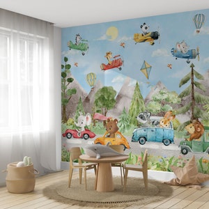May include: A whimsical nursery wall mural featuring a blue sky with clouds, mountains, and trees.  Animals, including a bear, elephant, raccoon, lion, and rabbit, are driving cars and airplanes.  The mural is perfect for a child's bedroom or playroom.