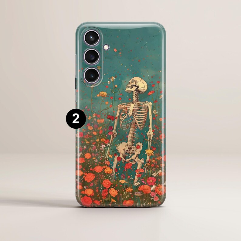 May include: A phone case featuring a skeleton standing in a field of flowers. The skeleton is white and the flowers are a variety of colours, including red, orange, yellow, and pink. The background is a light blue.