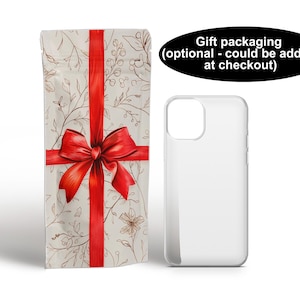 Op de afbeelding: Een witte telefoonhoes met een rode strik en een bloemenpatroon. Geschenkverpakking is beschikbaar bij het afrekenen.