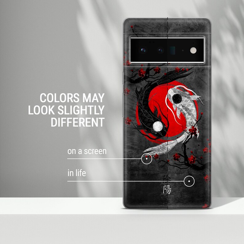 May include: Black and white koi fish swimming around a red circle on a gray background. The background has a textured look. The phone case has a black border and a camera cutout.