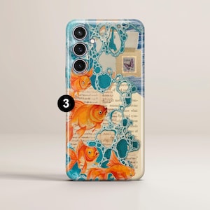 May include: A phone case with a blue and white background featuring gold fish and bubbles. The background also includes a vintage text overlay and a butterfly.