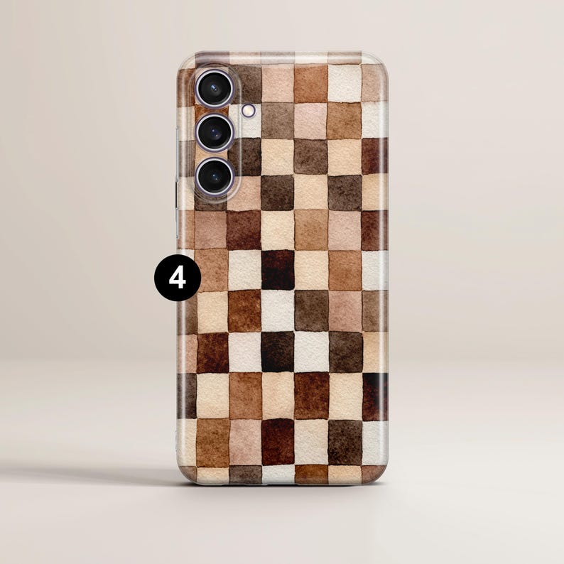 May include: A rectangular phone case with a watercolor checkerboard pattern in shades of brown, beige, and white. The case has a camera module with three lenses and a flash. The number "4" is printed on the side.