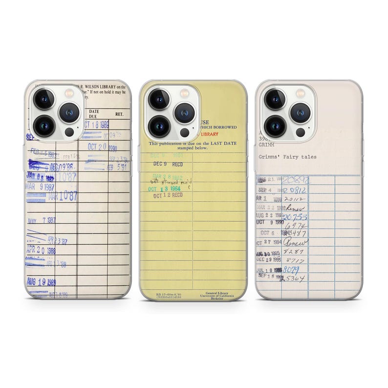 May include: Three iPhone cases with a library card design. The cases are clear and show the design through the case. The library card designs feature a yellowed paper background with blue and green ink. The text on the cards includes dates, due dates, and the title "Grimms' Fairy Tales".
