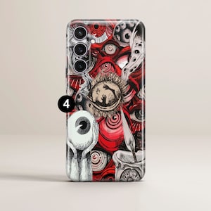 May include: A phone case with a red, white, and black design featuring multiple eyes and a hand reaching out from a large eye. The case has a camera cutout with three lenses.