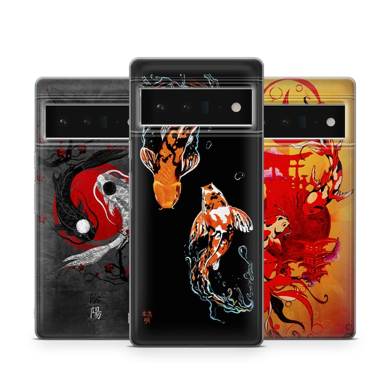 May include: Three phone cases with different designs. The first case features a black and white yin yang symbol with a red circle and a koi fish. The second case features a black background with three orange and white koi fish. The third case features a red and orange koi fish with a Japanese temple and flowers on a yellow background.