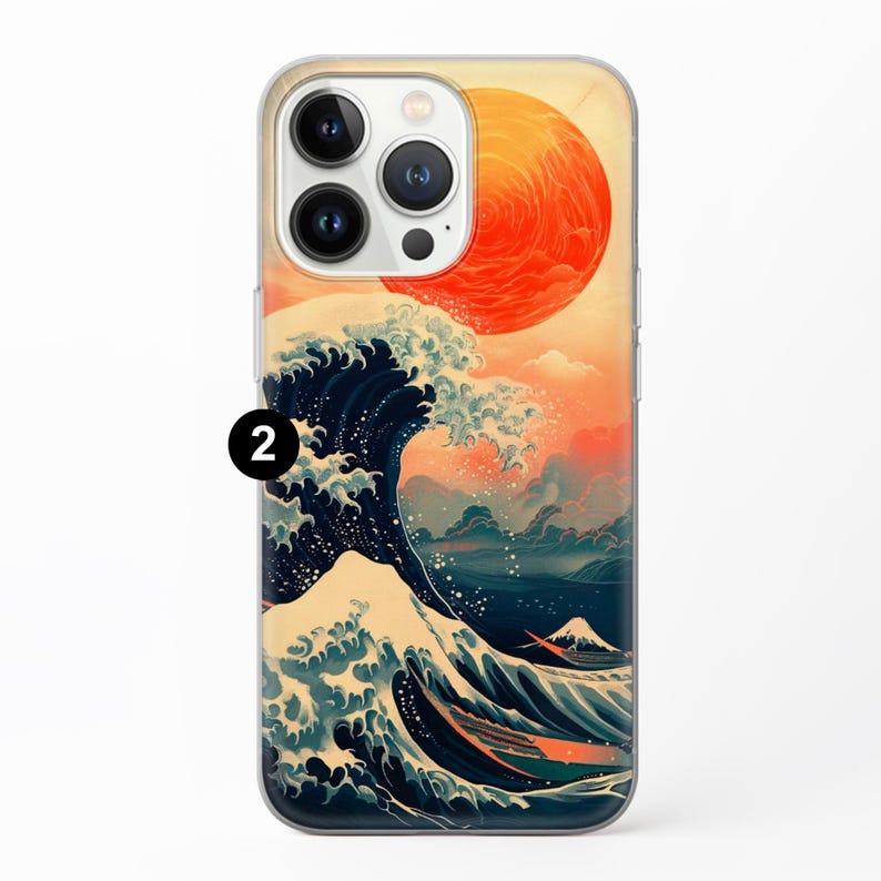 Puede incluir: Una funda transparente para tel&eacute;fono con un dise&ntilde;o de una gran ola y un sol rojo en el fondo. La ola es azul y blanca con un toque de naranja. El sol es de un naranja brillante.