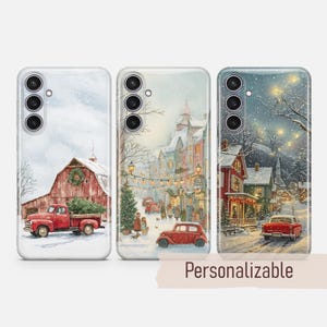 May include: Three phone cases with winter scenes. One features a red truck and barn, another a town square with a Christmas tree, and the last a snowy street with a red car. The word "Personalizable" is at the bottom.