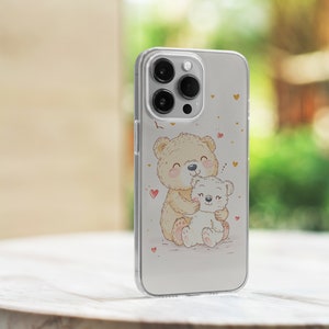 May include: A clear phone case with a cute illustration of two teddy bears hugging. The bears are surrounded by small pink hearts. The case is designed for an iPhone.