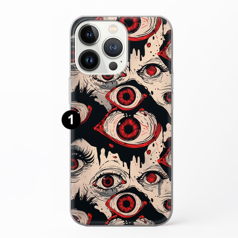 May include: A clear phone case with a design of red eyes on a black background. The eyes are drawn in a graphic style and appear to be dripping with black liquid.