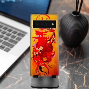 May include: A yellow, red, and black phone case with a Japanese-inspired design featuring two koi fish swimming around a red temple. The case has a black camera cutout and a black stand.