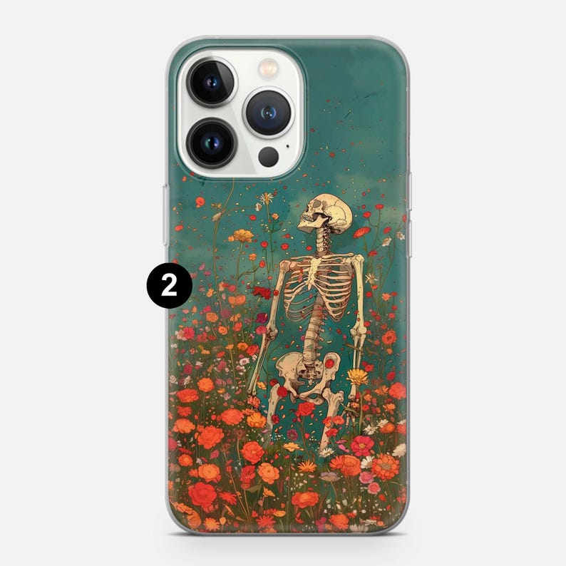 May include: A clear phone case with a colorful floral design and a skeleton standing in the middle. The skeleton is facing forward with its arms raised and its head tilted back. The flowers are in shades of red, orange, yellow, and pink.