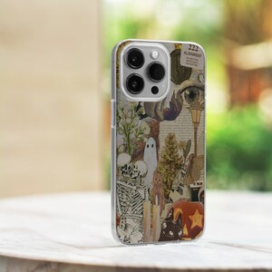May include: A clear phone case with a collage of vintage Halloween imagery, including a skeleton couple, a ghost, a cat, a pumpkin, and a star. The text "222 ALIGNMENT YOU ARE IN THE RIGHT PLACE & THE RIGHT TIME" is visible on the case.