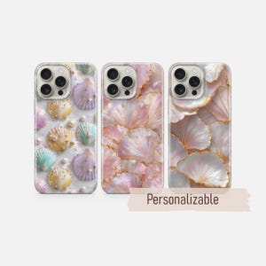 May include: Three phone cases with seashell designs. The first case features pastel seashells and pearls. The second case has a pink seashell pattern. The third case has a white and gold seashell design. The text "Personalizable" is visible.