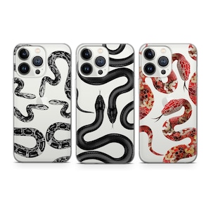 Może przedstawiać: Trzy etui na iPhone'a z różnymi wzorami węży. Pierwsze etui przedstawia czarne węże na białym tle. Drugie etui przedstawia czerwone węże na białym tle. Trzecie etui przedstawia czarne węże na białym tle.