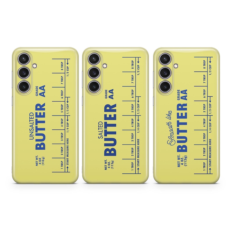 May include: Three yellow phone cases with a butter stick design. Each case features a different type of butter: unsalted, salted, and smooth like butter. The cases have a measurement guide on the back, showing the equivalent of tablespoons to cups.