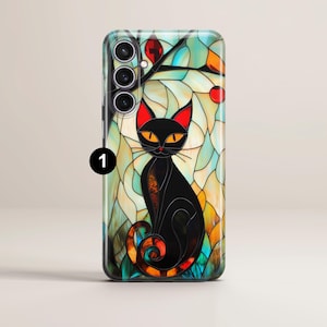 May include: A black cat with red eyes sits in a stained glass window design. The window is a mix of blue, green, yellow, and red glass. The cat is sitting on a branch with red berries.