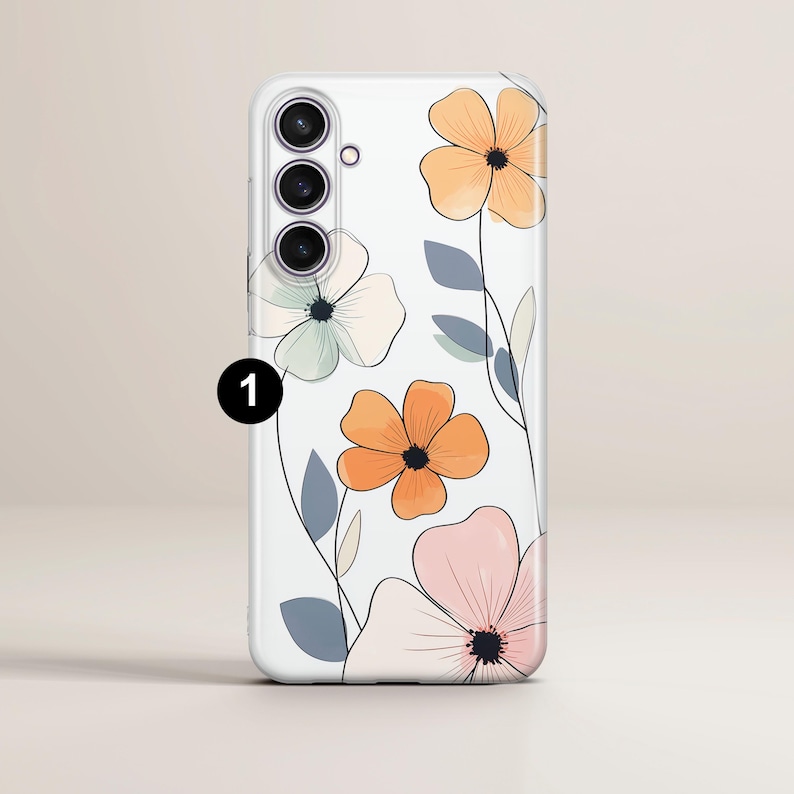 May include: A clear phone case featuring a floral design with orange, pink, and white flowers. The flowers have black centers and are set against a white background. The case has a camera cutout and a black number 1.