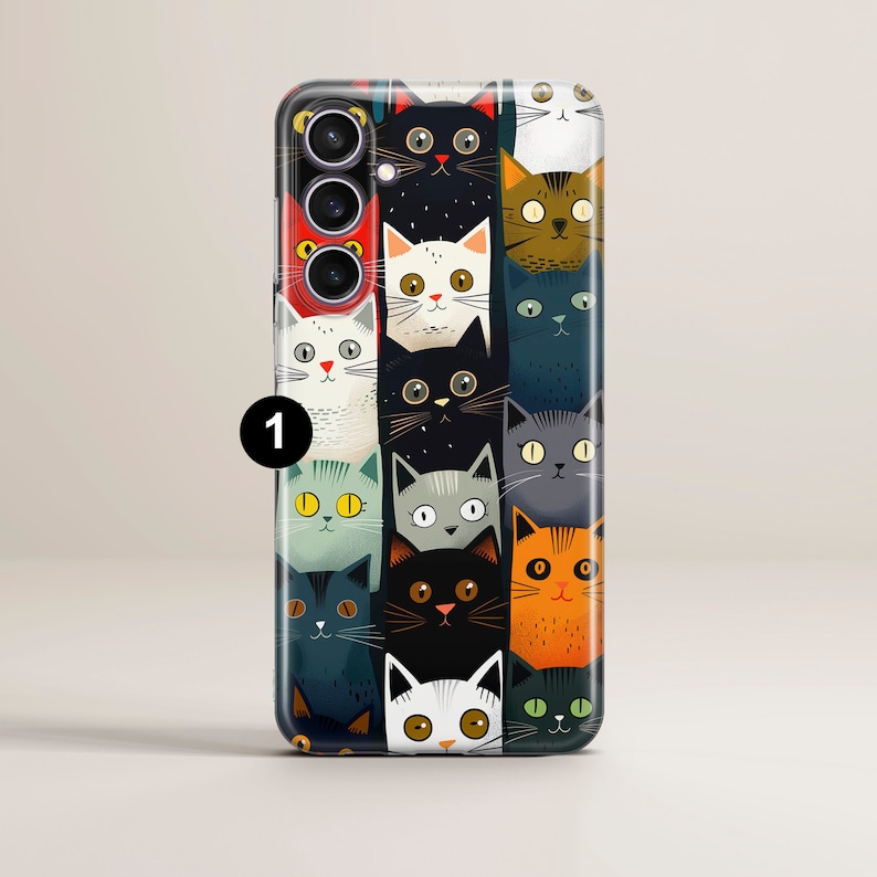 May include: A phone case with a colorful pattern of cats. The case has a black background with a variety of cats in different colors and patterns. The cats are all looking at the camera.