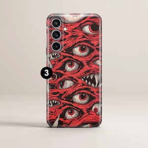 May include: Red phone case with a graphic of multiple eyes and mouths. The case has a camera cutout for a triple lens camera.