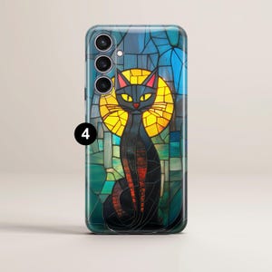 May include: A black cat with yellow eyes sits in a stained glass window design. The window is made of colorful glass pieces, including blue, green, yellow, and red. The cat is in the center of the window, and the sun is shining through the glass, creating a halo effect around the cat.