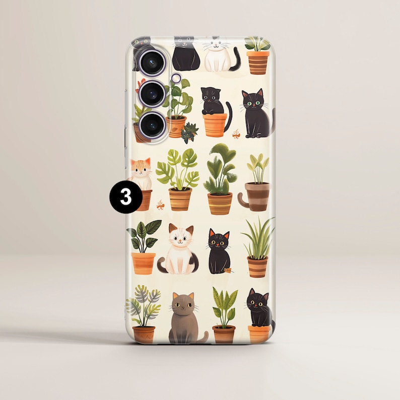 May include: A phone case with a white background and a repeating pattern of cats and plants in pots. The cats are black, white, and orange. The plants are green and have brown pots. The phone case has a clear back and a black camera housing.