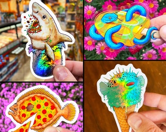 Food Animals Sticker Pack of 4 CLEAR & HOLOGRAPHIC STICKERS: Burrito Shark, Snake Popsicle, pufferfish ice cream, Flounder Pizza! Shark eye