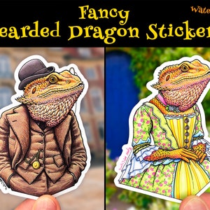 May include: Two bearded dragon stickers, one in a dapper gentleman's outfit with a top hat and monocle, the other in a fancy dress with a floral pattern. Both stickers are waterproof.