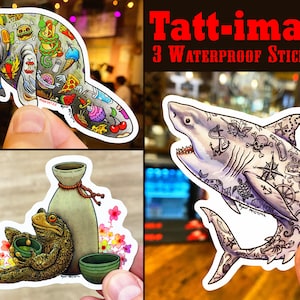 May include: Three waterproof stickers featuring colorful illustrations of a manatee, a shark, and a frog. The manatee is covered in tattoos of food and other items. The shark is covered in tattoos of nautical items. The frog is sitting next to a sake bottle and holding a cup of tea.
