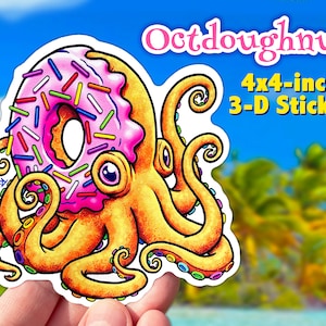 May include: A 4x4-inch 3-D sticker of an octopus with a pink and white donut for a head. The donut has colorful sprinkles. The octopus is yellow with colorful rings around its tentacles. The sticker is on a hand against a blue sky and palm trees background.