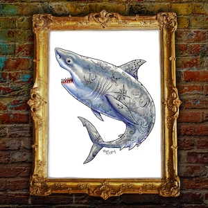 May include: A white shark with a nautical tattoo design, including anchors, a skull and crossbones, a compass, and a mermaid. The shark is swimming to the right, with its mouth open and teeth visible. The image is framed in a gold frame.