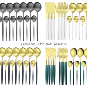 May include: Assortment of modern flatware sets in various colors, including black, gold, and teal. Each set includes forks, knives, spoons, and teaspoons. The text in the image reads "Indicates Color, Not Quantity."