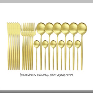 May include: A set of gold-colored flatware, including knives, forks, spoons, and teaspoons. The image shows a complete set of utensils for a dining table. The text at the bottom reads "INDICATES COLOR; NOT QUANTITY."