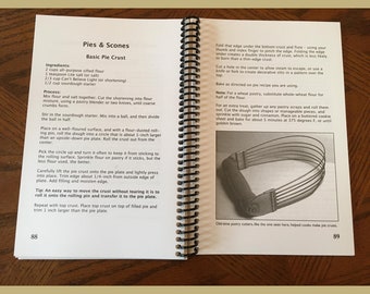 May include: A close-up of a pie crust recipe with instructions on how to make a basic pie crust. The image shows a pie crust cutter, a tool used to create decorative edges on pie crusts.