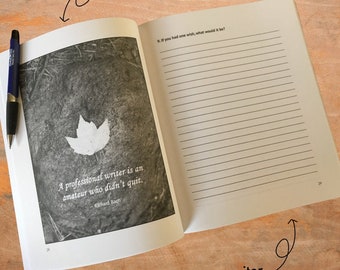 May include: A black and white photo of a leaf on the ground with the quote "A professional writer is an amateur who didn't quit." by Richard Bach. The image is from a writing journal for kids ages 8-12.