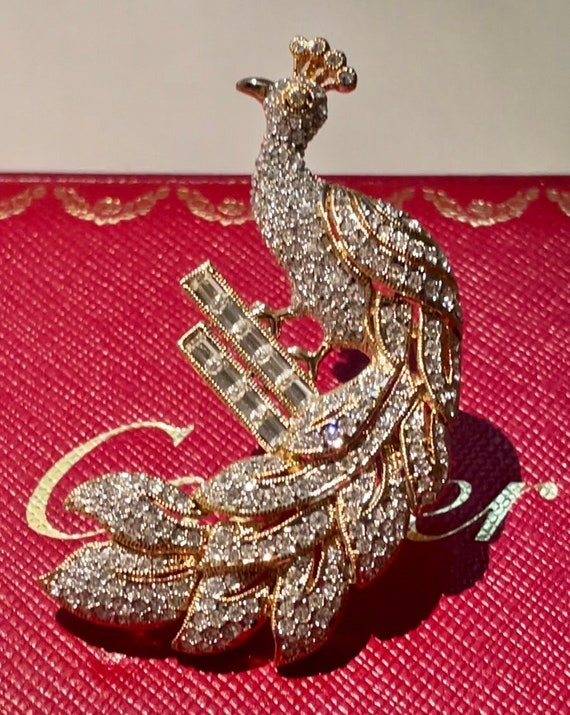 The peacock brooch discount