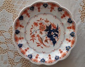 Beautiful (20 cm) handpainted dish. Made by De Porceleyne Fles in Delft. Mid 20th century.