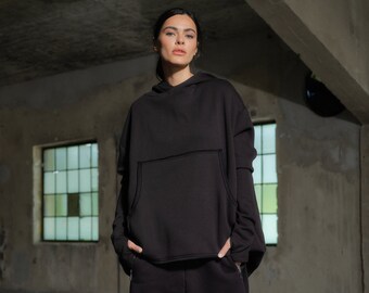 Handgemaakte asymmetrische gewatteerde katoenen hoodie: oversized sweater met duimgat