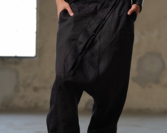 Pantaloni di lino con cavallo basso all'avanguardia, pantaloni