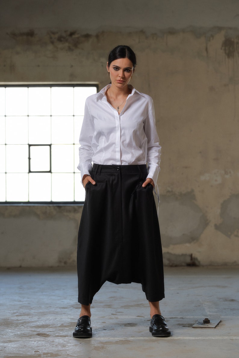 Black wool drop crotch pants with asymmetrical details, Avant-garde  pants Women, Baggy pants, Minimalist urban sustainable clothing