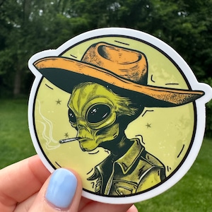 Cowboy Alien Smoking Vinyl Sticker Perfect voor elke liefhebber van de ruimte