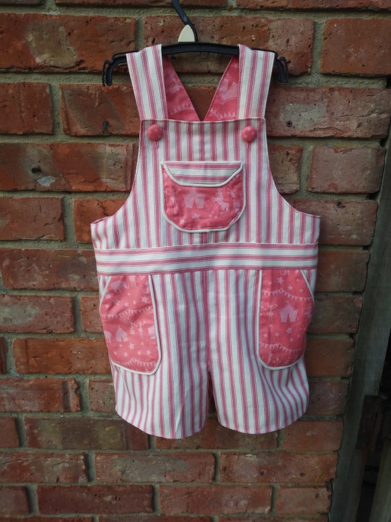 pink short dungarees