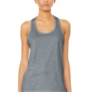 May include: A gray racerback tank top with a scoop neck. The tank top is made of a soft, comfortable fabric and has a relaxed fit.
