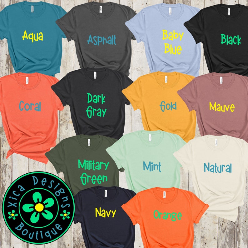 Puede incluir: Una colecci&oacute;n de camisetas de varios colores, cada una con un nombre de color diferente en una fuente contrastante. Los colores incluyen Aqua, Asphalt, Baby Blue, Black, Coral, Dark Gray, Gold, Mauve, Military Green, Mint, Natural, Navy y Orange. El logotipo de Xica Designs Boutique est&aacute; en la esquina inferior izquierda.