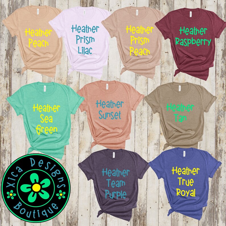 Peut inclure: Neuf t-shirts de couleurs diff&eacute;rentes avec le texte "Heather" et un nom de couleur sur chaque t-shirt. Les t-shirts sont dispos&eacute;s en trois rang&eacute;es de trois t-shirts chacune.