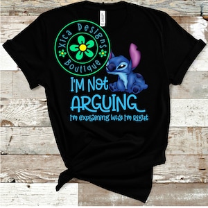 May include: A black short-sleeve t-shirt featuring a graphic of the blue character Stitch. The text reads "I'M NOT ARGUING I'm explaining WHY I'M RIGHT" in light blue. A circular green logo with a flower and the text "Xica Designs Boutique" is included.