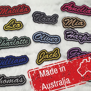 May include: A collection of 12 personalised embroidered iron-on patches with various names, including Amelia, Matilda, Noah, Mia, Oliver, Harper, Jack, William, Thomas, Charlotte, Leo, and Grace. The patches are made in Australia and feature a variety of colours and fonts.