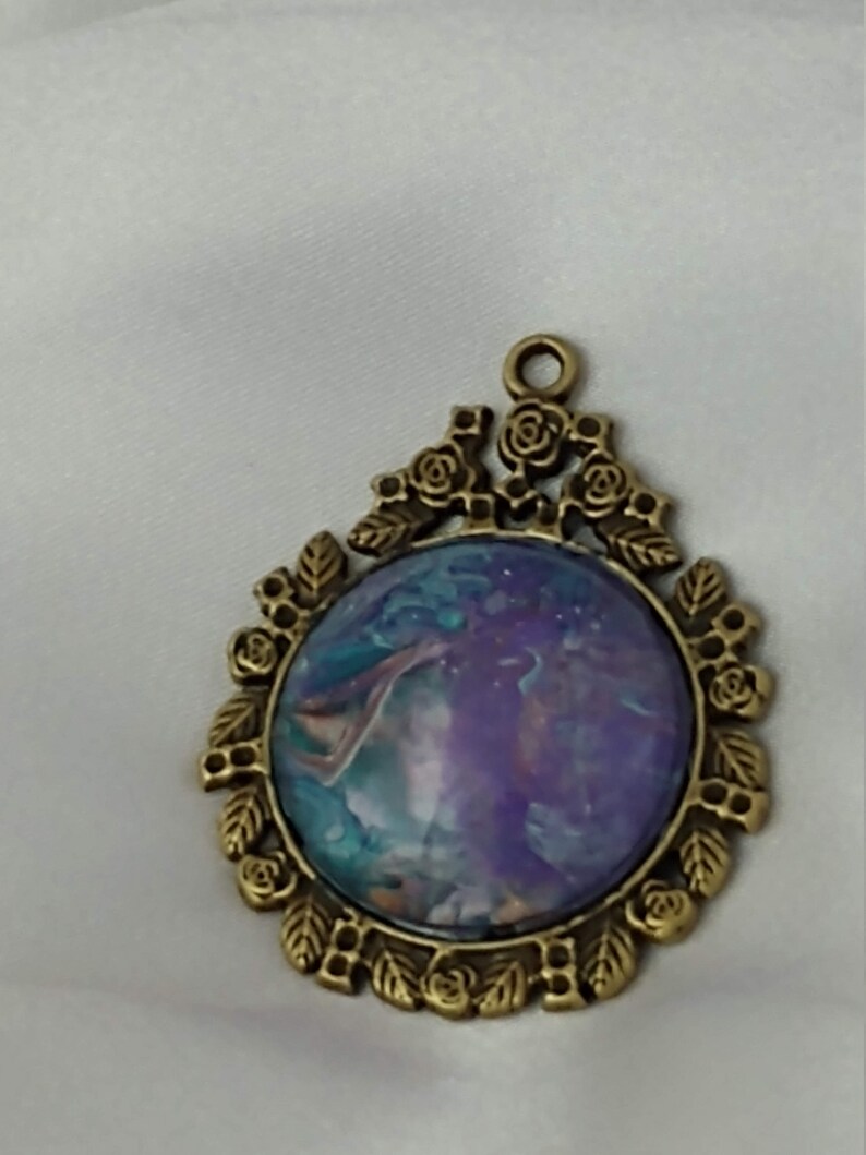 Teal Pendant Purple metallic swirl framed in bronze roses